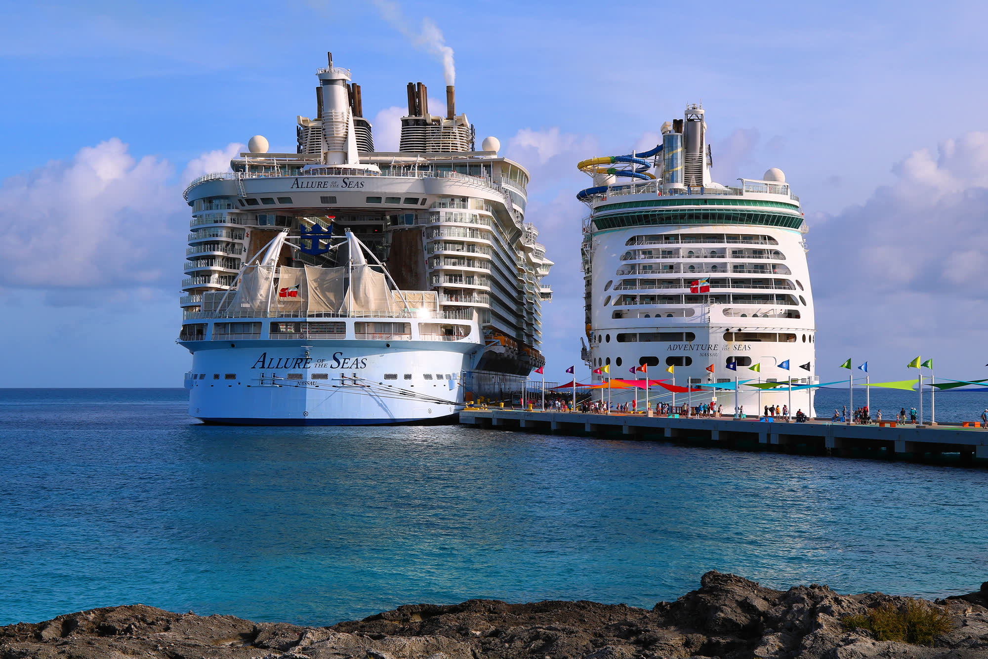 Cruise liners berthed at a tropical island
